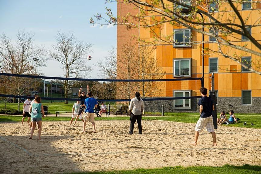 Students playing volleyball